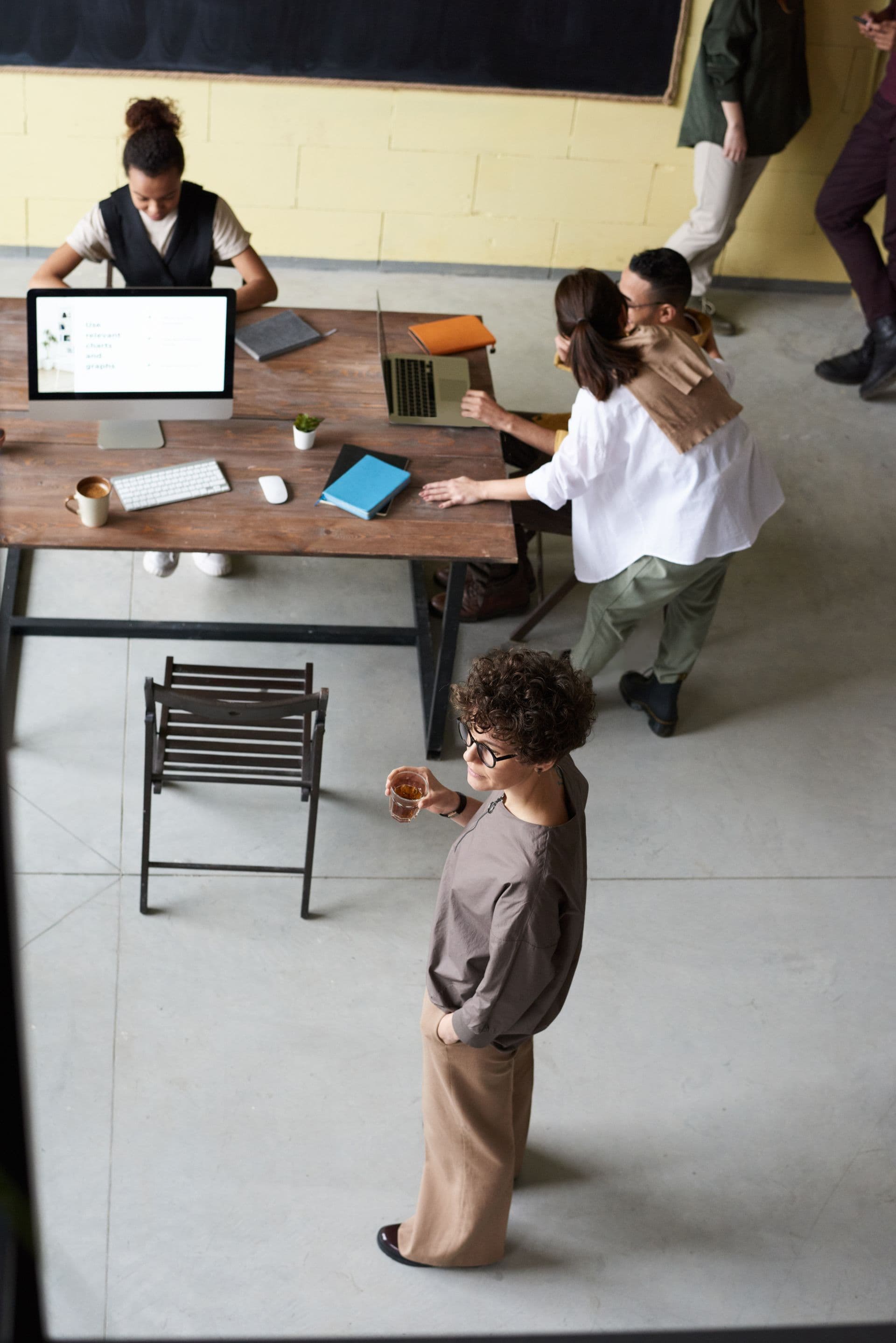 Team reviewing work together at a desk
