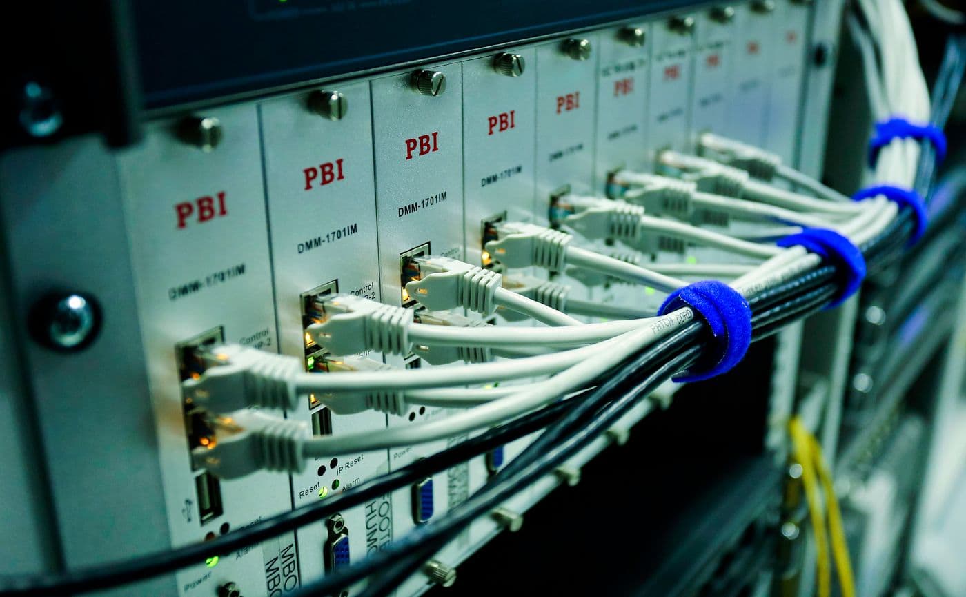 Control hardware and cabling behind a radio operating position